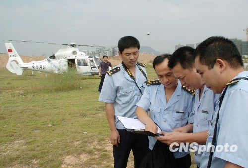 中国海监空地协同执行任务。 中新社发 罗仰明 摄
